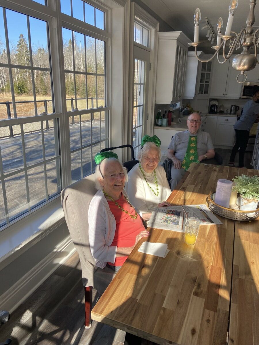 Three of our seniors bedazzled in St. Patty's jewelry